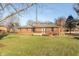 Brick ranch house with deck and spacious backyard at 1028 S Country Ln, Greenfield, IN 46140