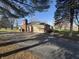 Attached brick garage with large driveway at 1028 S Country Ln, Greenfield, IN 46140