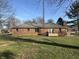 Brick ranch house with a spacious backyard at 1028 S Country Ln, Greenfield, IN 46140