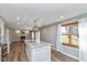 Kitchen island with granite countertop and farmhouse sink at 1028 S Country Ln, Greenfield, IN 46140