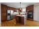 Modern kitchen with stainless steel appliances and an island at 11575 Reagan Dr, Fishers, IN 46038