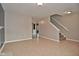 Spacious living room with tile floors and a view to the kitchen at 139 Fountain Dr, Mooresville, IN 46158