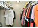 Well-organized closet with double hanging rods and shelving at 1732 N Lynhurst Dr, Speedway, IN 46224