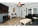 Living room with fireplace and built-in shelving at 1732 N Lynhurst Dr, Speedway, IN 46224