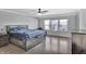 Spacious bedroom with hardwood floors and large windows at 2034 Buckthorn Dr, Columbus, IN 47201