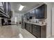 Spacious kitchen with granite countertops and dark wood cabinets at 2856 Jamieson Ln, Indianapolis, IN 46268