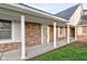 Covered porch entrance with brick columns and a spacious entryway at 2856 Jamieson Ln, Indianapolis, IN 46268