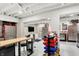 Well-equipped basement workshop featuring ample storage and workbenches at 4621 N Meridian St, Indianapolis, IN 46208