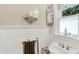 Small bathroom with white tile and a pedestal sink at 4621 N Meridian St, Indianapolis, IN 46208