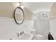 Charming bathroom with white subway tile and an oval mirror at 4621 N Meridian St, Indianapolis, IN 46208