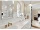 Bright bathroom features double vanity, white tile, and large mirrors at 4621 N Meridian St, Indianapolis, IN 46208