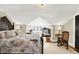 Spacious bedroom with a king-size bed and dormer windows at 4621 N Meridian St, Indianapolis, IN 46208