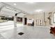 Bright and spacious three-car garage with epoxy flooring and storage at 4621 N Meridian St, Indianapolis, IN 46208
