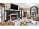 Elegant living room features a fireplace, hardwood floors, and ample natural light at 4621 N Meridian St, Indianapolis, IN 46208