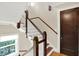 Stunning staircase with dark wood and white balusters at 4621 N Meridian St, Indianapolis, IN 46208