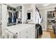 Spacious walk-in closet with ample storage, island, and hanging rods at 4621 N Meridian St, Indianapolis, IN 46208