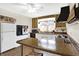 Kitchen with granite countertops and black appliances at 4817 Welton St, Greenwood, IN 46143