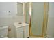 Simple bathroom with shower, sink, and toilet at 565 N Rural St, Indianapolis, IN 46201