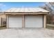 Two-car garage with roll-up doors at 7602 S County Road 450 W, Stilesville, IN 46180