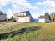 Two-story house with attached garage and white fence at 9916 Wellsford Cir, Indianapolis, IN 46236