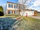 Two-story house with attached garage and playground in backyard at 9916 Wellsford Cir, Indianapolis, IN 46236