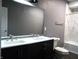 Updated bathroom with double vanity and marble shower at 1314 Arrow Ave, Anderson, IN 46016