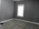 Bright bedroom with gray walls and carpet flooring at 1314 Arrow Ave, Anderson, IN 46016