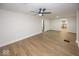 Open living room with hardwood floors, leading to kitchen at 937 E Berwyn St, Indianapolis, IN 46203