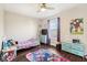 bedroom with twin bed, colorful rug, and plenty of storage at 18828 Wimbley Way, Noblesville, IN 46060