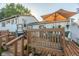 Wooden deck with patio furniture and hanging planters at 801 Spring Valley Dr, Indianapolis, IN 46231