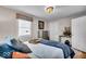 Bright bedroom with a comfortable bed and neutral decor at 2222 E 75Th St, Indianapolis, IN 46240