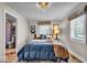 Cozy bedroom with a comfortable bed and charming decor at 2222 E 75Th St, Indianapolis, IN 46240