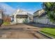 Garage with mural and spacious driveway at 2222 E 75Th St, Indianapolis, IN 46240