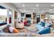 Spacious living room features a stone fireplace and comfortable seating at 2222 E 75Th St, Indianapolis, IN 46240