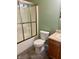 Full bathroom with tub/shower combo and oak vanity at 7254 Broyles Ln, Indianapolis, IN 46217