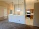 Open concept kitchen with oak cabinets and breakfast bar at 7254 Broyles Ln, Indianapolis, IN 46217