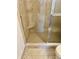 Clean shower with tiled walls and built-in seat at 7254 Broyles Ln, Indianapolis, IN 46217