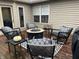 Relaxing patio with fire pit and comfortable seating at 11333 Harrington Ln, Fishers, IN 46038