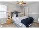 Cozy bedroom with a double bed, nightstands, and ceiling fan at 12551 Brookhaven Dr, Fishers, IN 46037