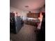Simple kitchen with wood cabinets and dark appliances at 1510 E Gimber St, Indianapolis, IN 46203