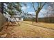 Backyard with swing set and partial view of house at 2521 Prospect St, Indianapolis, IN 46203