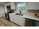 Modern kitchen with white cabinets and quartz countertops at 2534 S E St, Elwood, IN 46036