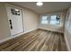 Sunroom with new flooring and neutral walls at 2534 S E St, Elwood, IN 46036