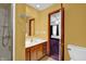 Bathroom with shower, vanity, and access to bedroom at , Columbus, IN 47203