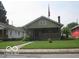 Charming bungalow with brick facade and a spacious lawn at 3953 English Ave, Indianapolis, IN 46201