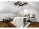 Bright bedroom with hardwood floors and exposed beams at 5858 N Delaware St, Indianapolis, IN 46220