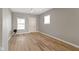 Spacious living area with hardwood floors and neutral color scheme at 1101 W Roache St, Indianapolis, IN 46208