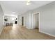 Open living space with hardwood floors and a view of the kitchen at 1101 W Roache St, Indianapolis, IN 46208