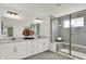 Elegant bathroom with double vanity and large walk-in shower at 1500 Chatham Village Blvd, Westfield, IN 46074