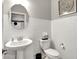 Small bathroom with white subway tile and pedestal sink at 20259 Chad Hittle Blvd, Westfield, IN 46074